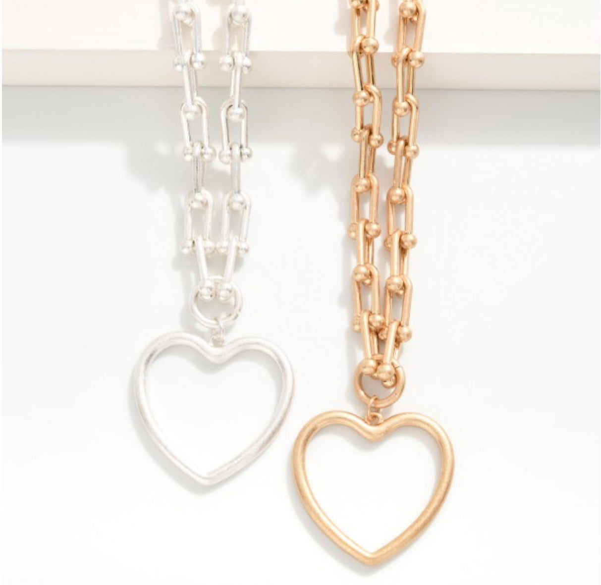 Metal Tone U Link Necklace Featuring Hollow Heart Pendant